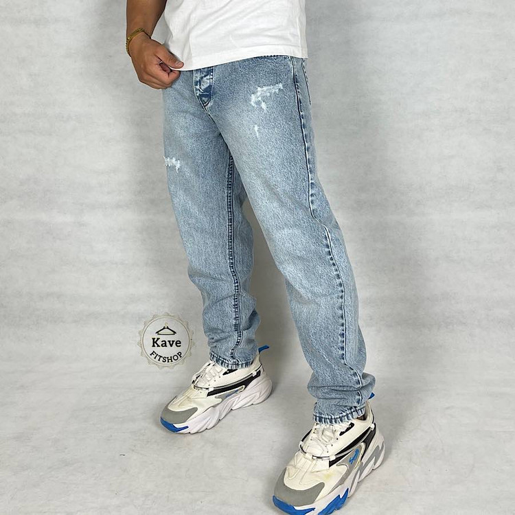 شلوار جین مردانه مدل مام فیت رنگ آبی روشن نمای چپ