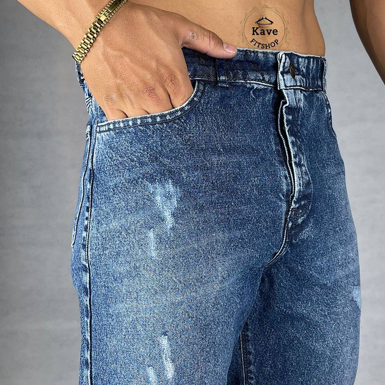 شلوار جین مردانه مدل مام فیت رنگ آبی نمای پارچه